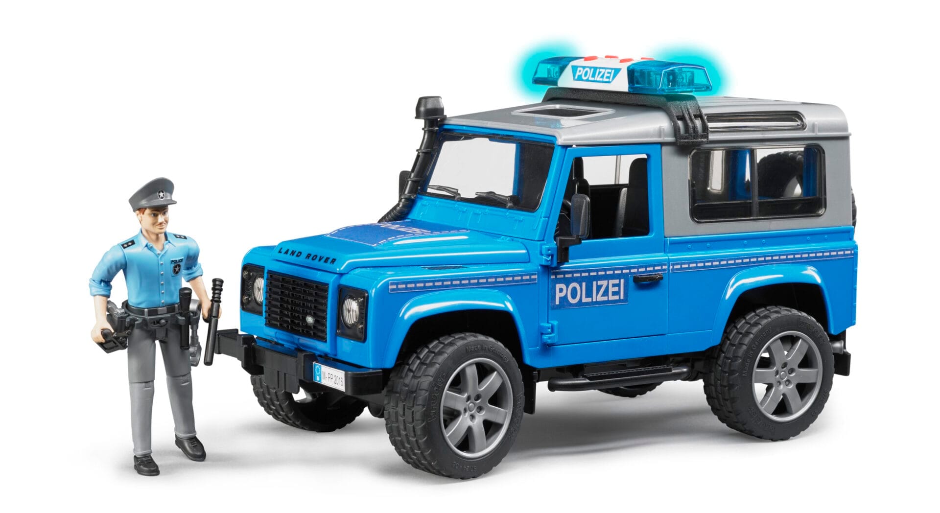 Auto Land Rover Defender - policyjny niebiesko srebrny z figurką policjanta i modułem - 02597 - BRUDER 1 Auto Land Rover Defender - policyjny niebiesko srebrny z figurką policjanta i modułem - 02597 - BRUDER