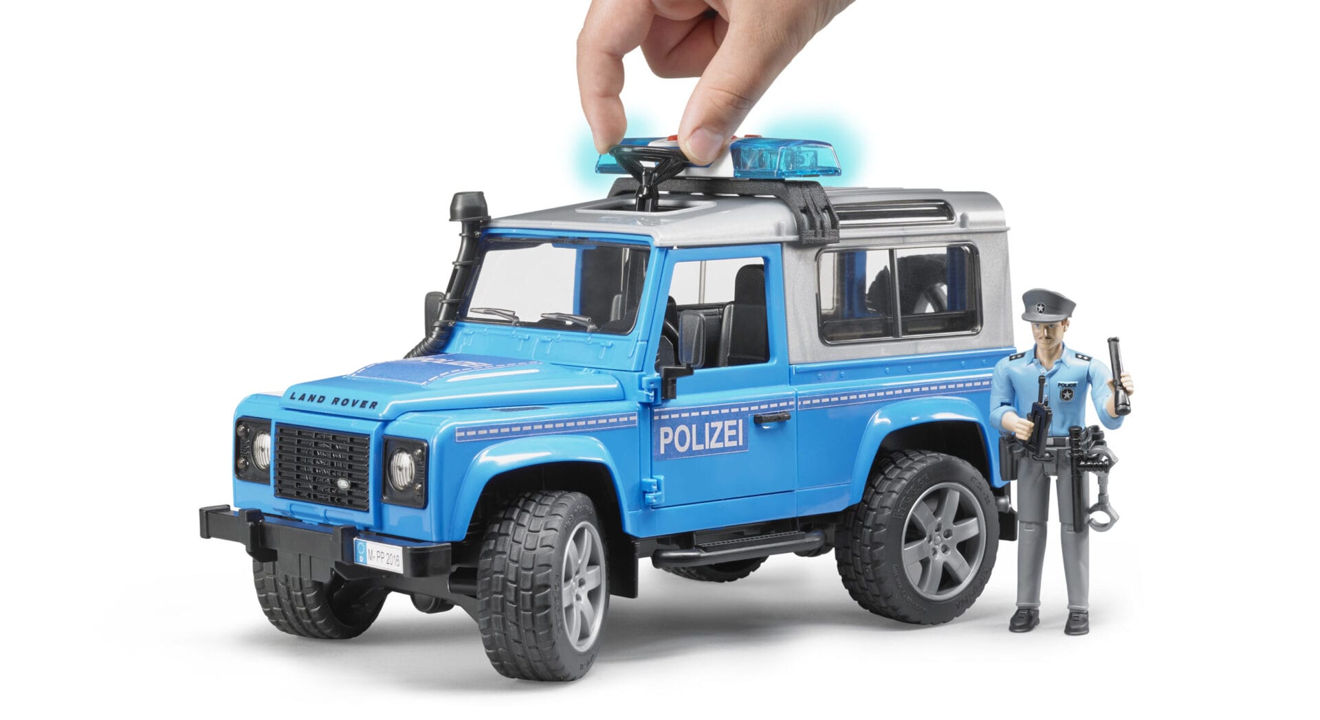 Auto Land Rover Defender - policyjny niebiesko srebrny z figurką policjanta i modułem - 02597 - BRUDER 8 Auto Land Rover Defender - policyjny niebiesko srebrny z figurką policjanta i modułem - 02597 - BRUDER